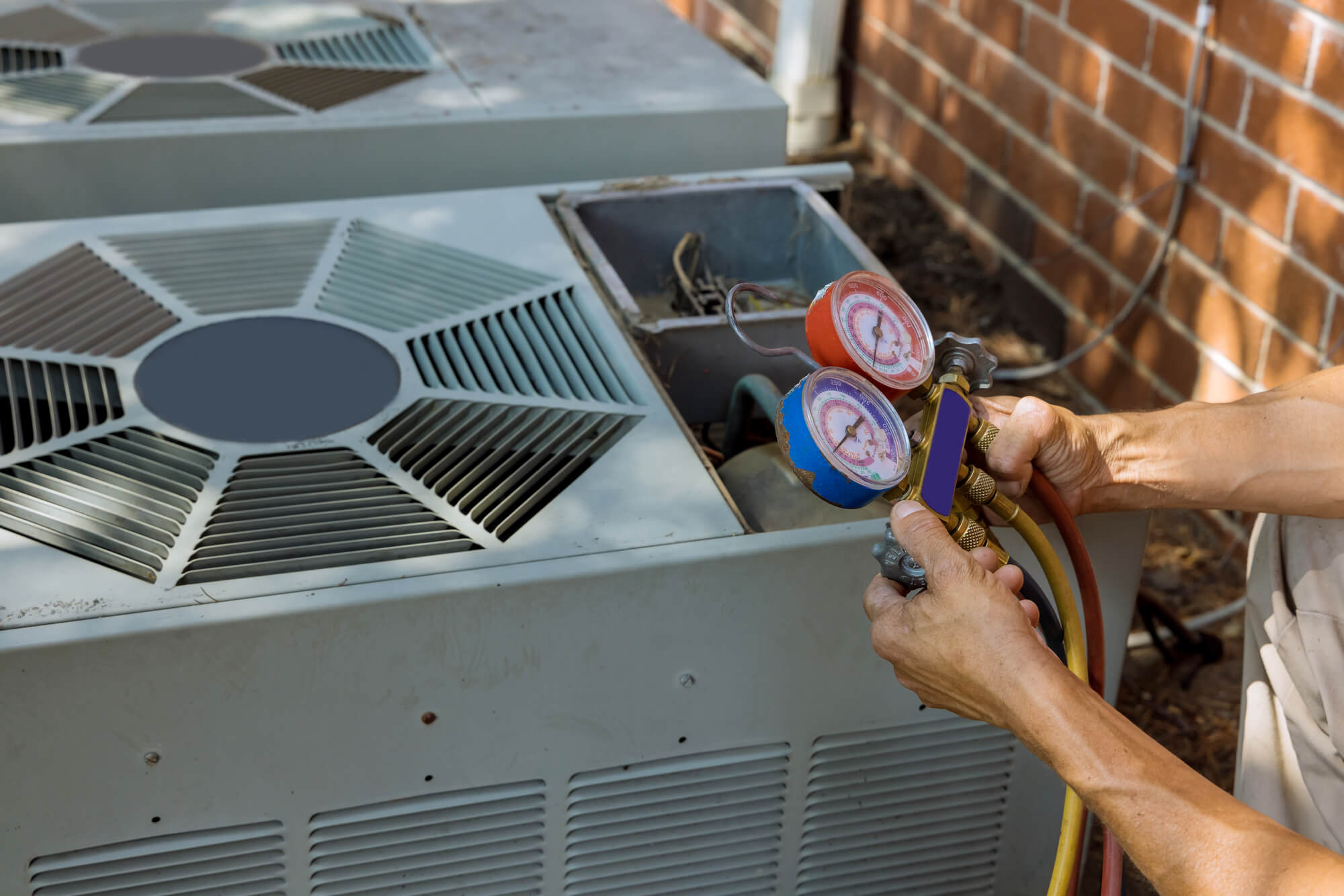 professional installing an AC