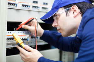 expert fixing electrical panels
